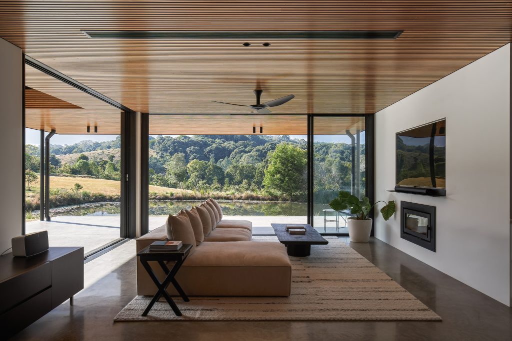 Coorabell Springs living room with concrete floors and timber batten ceilings