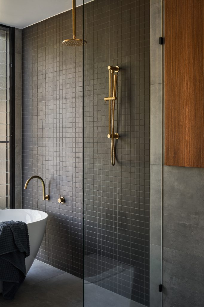 Coorabell Springs bathroom details dark grey tiles gold tapware