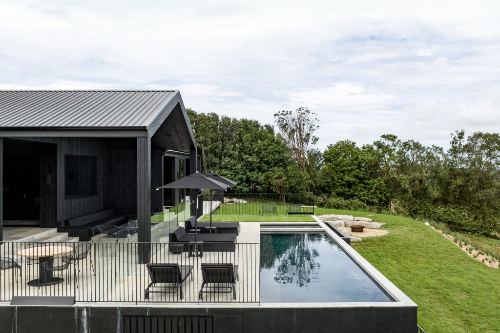 Nox Byron Bay exterior looking at pool and entertaining zones